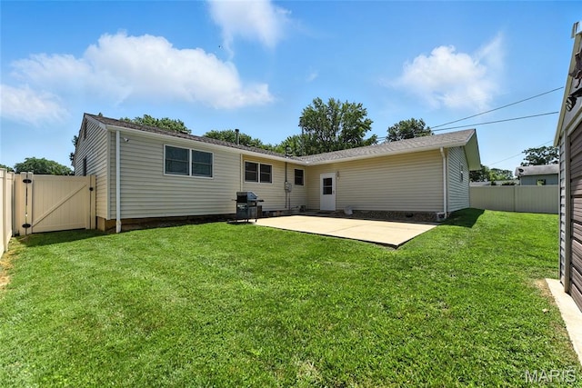 3205 Fleet Ln, Saint Charles, MO 63301 - back of house with a patio, a gate, and a fenced backyard