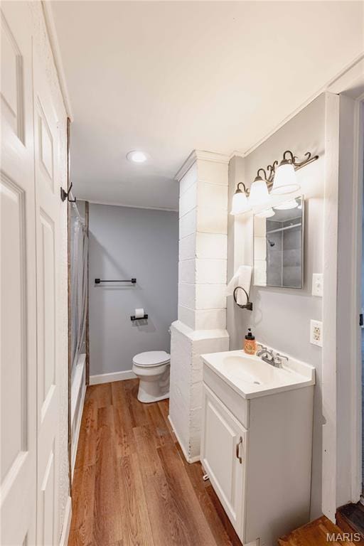 656 Sunset Farms Trl, Union, MO 63084 - full bathroom featuring vanity, wood finished floors, shower / bathtub combination with curtain, and recessed lighting
