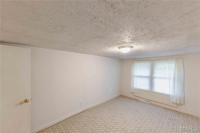 656 Sunset Farms Trl, Union, MO 63084 - unfurnished room with carpet flooring and a textured ceiling