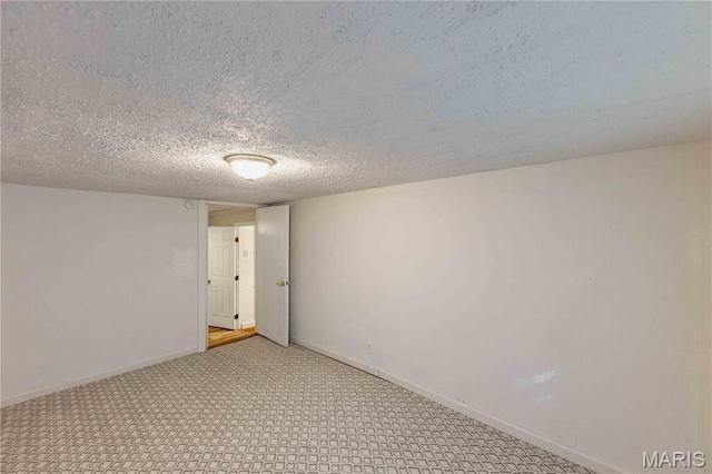 656 Sunset Farms Trl, Union, MO 63084 - carpeted empty room featuring baseboards and a textured ceiling