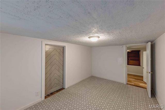 656 Sunset Farms Trl, Union, MO 63084 - unfurnished room with carpet floors and a textured ceiling