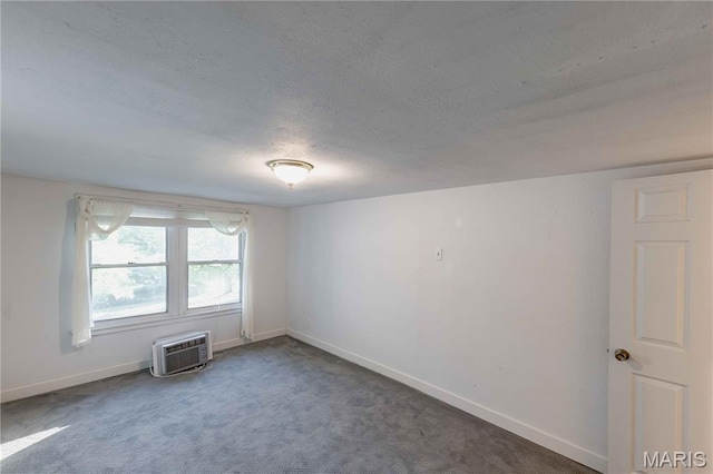 656 Sunset Farms Trl, Union, MO 63084 - empty room with a textured ceiling, an AC wall unit, and carpet flooring