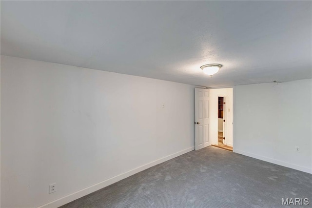 656 Sunset Farms Trl, Union, MO 63084 - spare room featuring baseboards and dark carpet