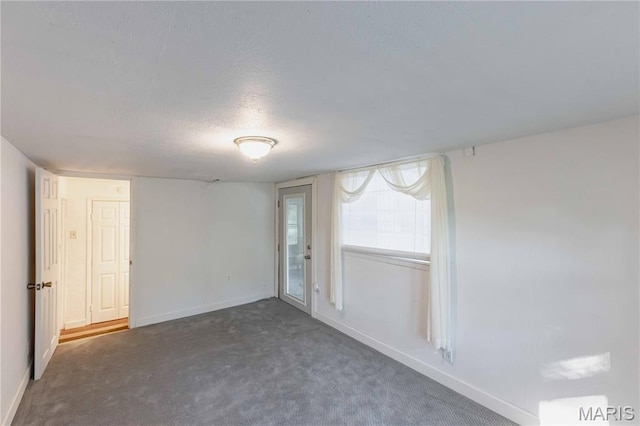 656 Sunset Farms Trl, Union, MO 63084 - carpeted spare room featuring baseboards and a textured ceiling