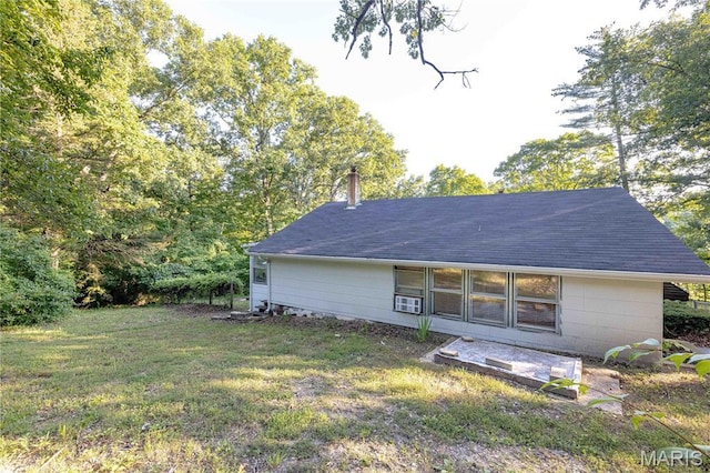 656 Sunset Farms Trl, Union, MO 63084 - rear view of property featuring a lawn and a shingled roof