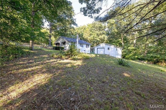 656 Sunset Farms Trl, Union, MO 63084 - view of yard with a garage and an outbuilding