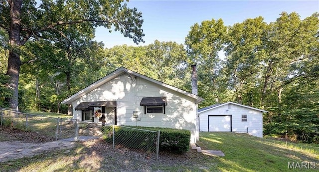 656 Sunset Farms Trl, Union, MO 63084 - rear view of house with a gate, an outdoor structure, and a garage