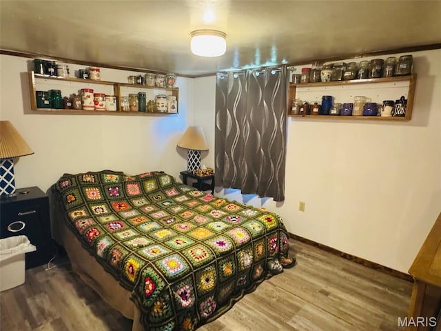 1516 W Main St, Vandalia, IL 62471 - bedroom featuring wood finished floors and baseboards
