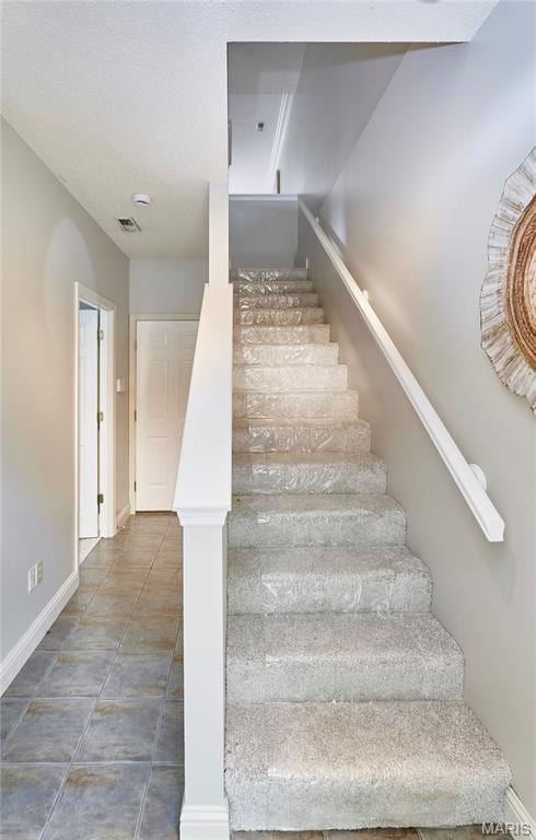 3432 Civic Green Dr, Saint Charles, MO 63301 - staircase featuring baseboards