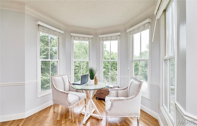 3432 Civic Green Dr, Saint Charles, MO 63301 - sunroom featuring a textured ceiling, crown molding, and wood finished floors