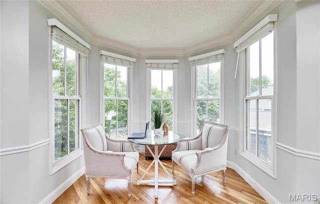 3432 Civic Green Dr, Saint Charles, MO 63301 - sunroom / solarium with a textured ceiling, wood finished floors, and crown molding
