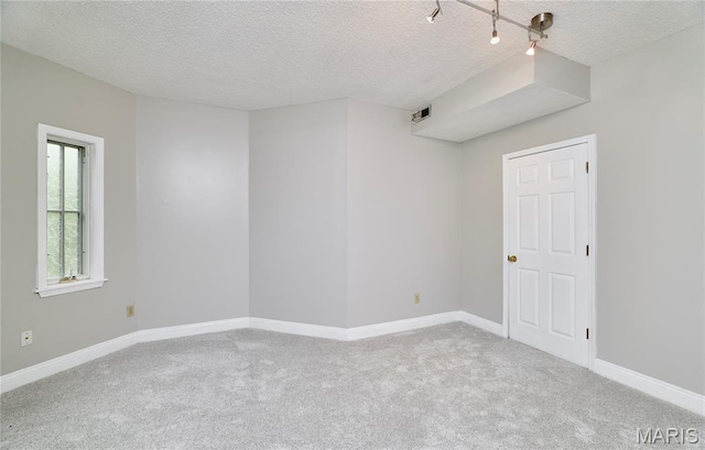 3432 Civic Green Dr, Saint Charles, MO 63301 - empty room with a textured ceiling and carpet flooring