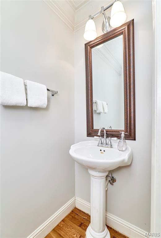 3432 Civic Green Dr, Saint Charles, MO 63301 - bathroom with ornamental molding and wood finished floors