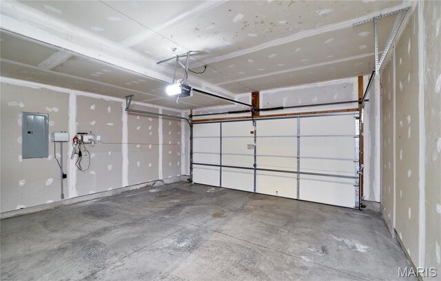 3432 Civic Green Dr, Saint Charles, MO 63301 - garage with electric panel and a garage door opener