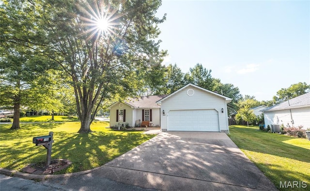 708 Chestnut Dr, Rolla, MO 65401 - ranch-style home featuring a garage, a front yard, and concrete driveway