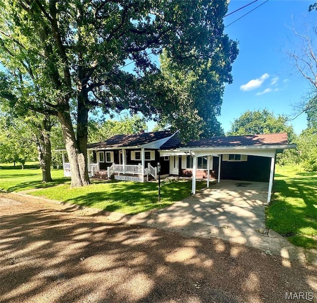 701 Alvarado, Belle, MO 65013 - ranch-style house with covered porch, a front lawn, driveway, and a carport