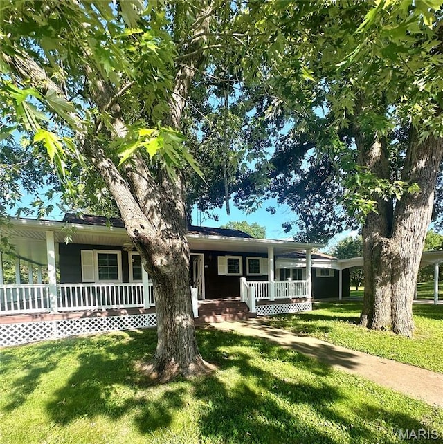701 Alvarado, Belle, MO 65013 - view of front of home featuring a porch and a front yard