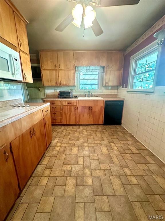 701 Alvarado, Belle, MO 65013 - kitchen featuring white appliances, light countertops, brick patterned flooring, and ceiling fan