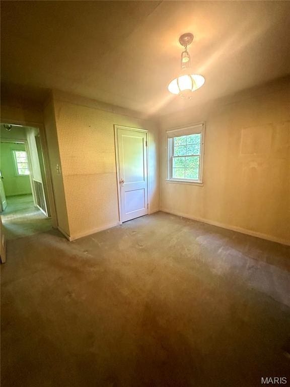 701 Alvarado, Belle, MO 65013 - carpeted empty room with baseboards