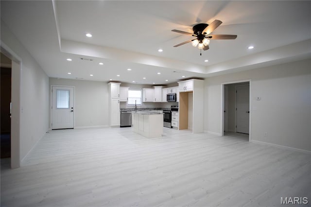 1205 Yosemite, Sikeston, MO 63801 - kitchen featuring stainless steel appliances, open floor plan, light wood-style floors, recessed lighting, and ceiling fan