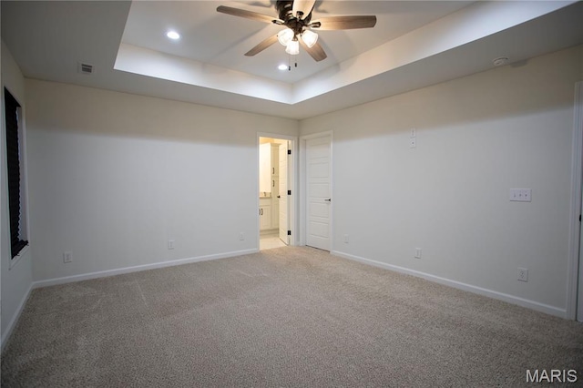 1205 Yosemite, Sikeston, MO 63801 - unfurnished room with ceiling fan, a raised ceiling, light carpet, and recessed lighting