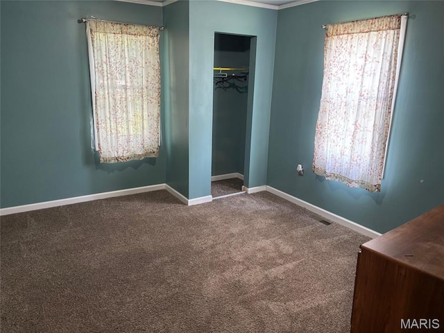 304 Taylor Ave, Park Hills, MO 63601 - unfurnished bedroom featuring carpet, crown molding, and a closet