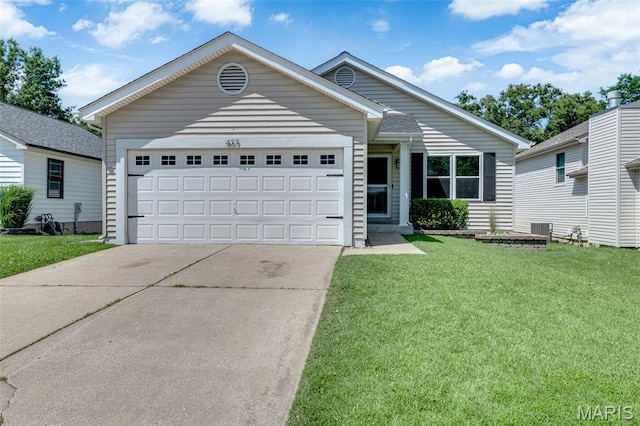 427 Xavier Ct, Valley Park, MO 63088 - ranch-style house featuring concrete driveway, a front lawn, and an attached garage