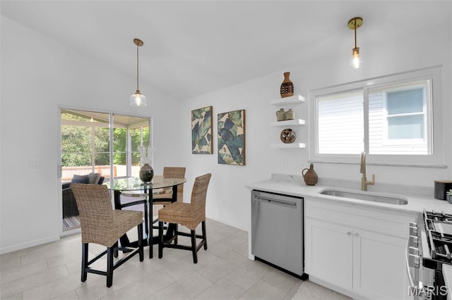 427 Xavier Ct, Valley Park, MO 63088 - kitchen with appliances with stainless steel finishes, vaulted ceiling, light countertops, and decorative light fixtures
