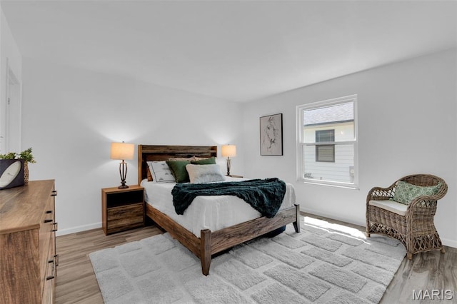 427 Xavier Ct, Valley Park, MO 63088 - bedroom featuring wood finished floors and baseboards