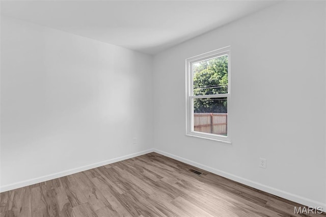 427 Xavier Ct, Valley Park, MO 63088 - empty room featuring wood finished floors