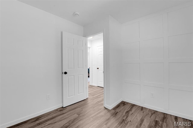 427 Xavier Ct, Valley Park, MO 63088 - unfurnished room with wood finished floors and a smoke detector