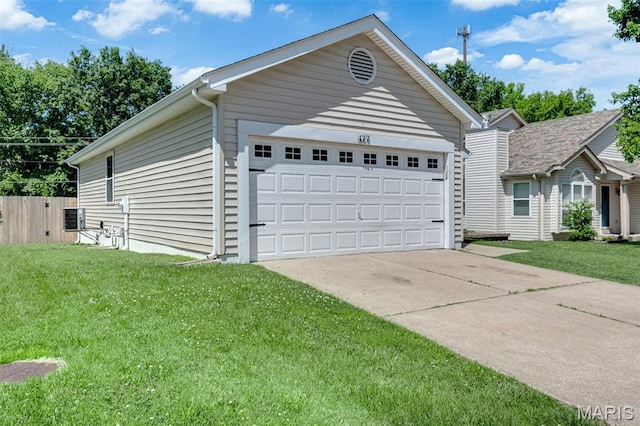 427 Xavier Ct, Valley Park, MO 63088 - view of front of house with a garage and an outbuilding