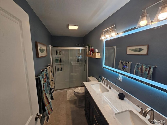 23 Hamlin Heights Dr, Hannibal, MO 63401 - full bath with a stall shower, double vanity, and tile patterned floors