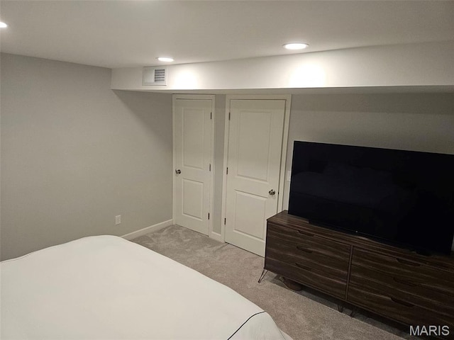23 Hamlin Heights Dr, Hannibal, MO 63401 - carpeted bedroom with recessed lighting