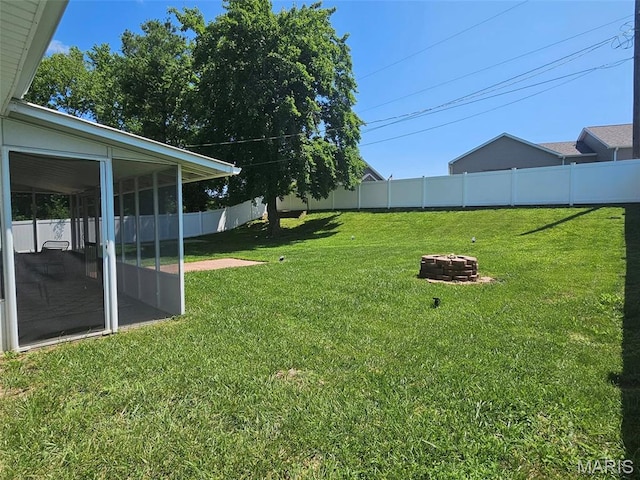 23 Hamlin Heights Dr, Hannibal, MO 63401 - view of yard with a fire pit and a sunroom