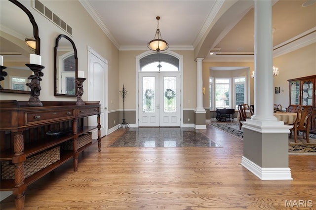 204 Logans Ct, Foristell, MO 63348 - entryway featuring decorative columns, crown molding, french doors, and wood finished floors