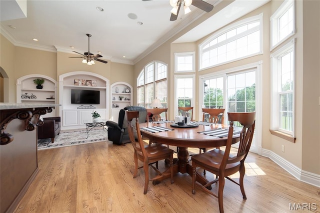 204 Logans Ct, Foristell, MO 63348 - dining area with ceiling fan, built in features, light wood-style flooring, crown molding, and recessed lighting