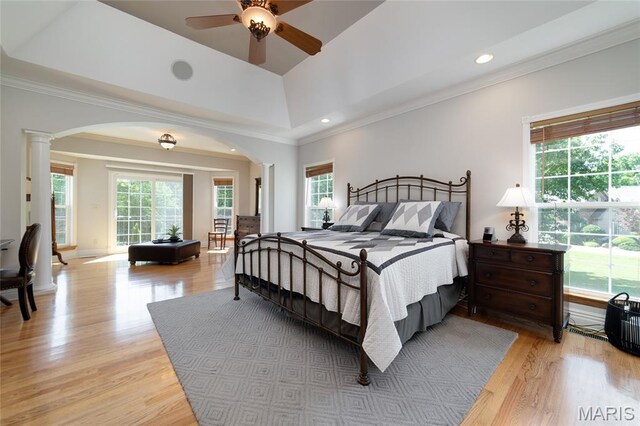 204 Logans Ct, Foristell, MO 63348 - bedroom featuring arched walkways, decorative columns, light wood finished floors, a ceiling fan, and recessed lighting