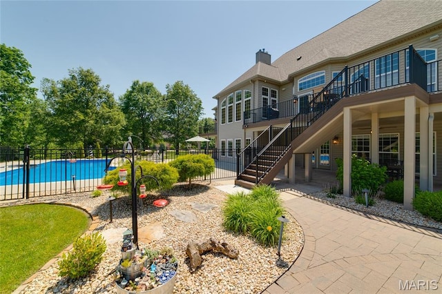 204 Logans Ct, Foristell, MO 63348 - view of pool featuring stairs and a patio