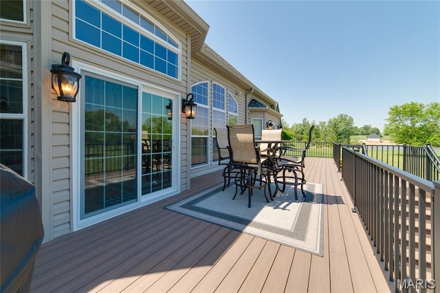 204 Logans Ct, Foristell, MO 63348 - deck featuring outdoor dining space and a grill