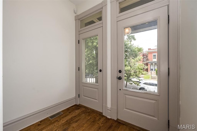 3822 Humphrey St, Saint Louis, MO 63116 - doorway to outside with dark wood-style flooring