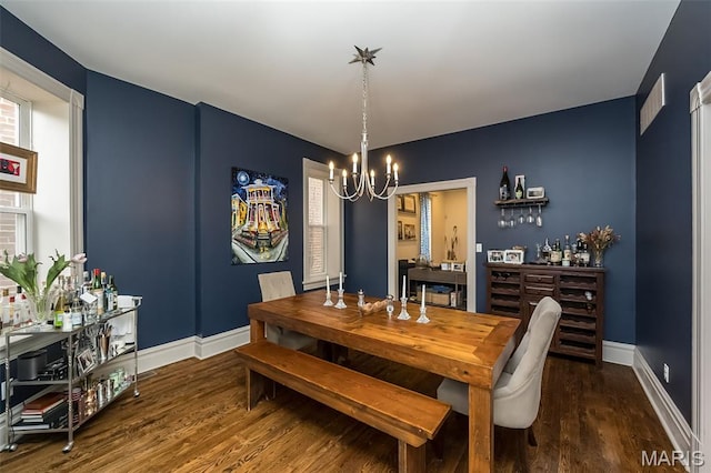 3822 Humphrey St, Saint Louis, MO 63116 - dining room with a chandelier and wood finished floors