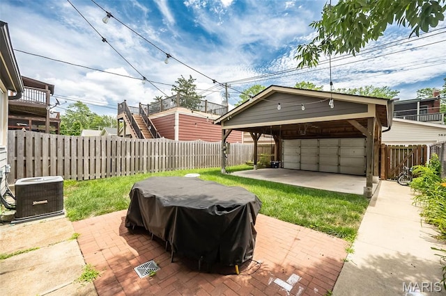 3822 Humphrey St, Saint Louis, MO 63116 - fenced backyard featuring area for grilling and a garage