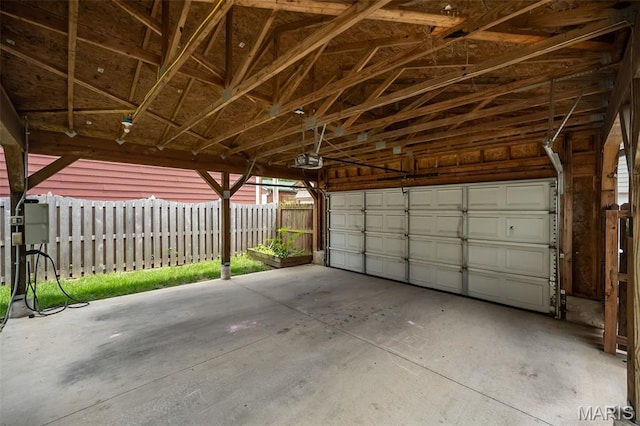 3822 Humphrey St, Saint Louis, MO 63116 - garage featuring a garage door opener