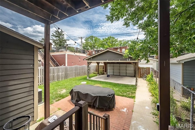 3822 Humphrey St, Saint Louis, MO 63116 - fenced backyard featuring an outdoor structure and a patio area