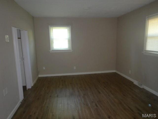 273 Buddie Ave, Saint Louis, MO 63135 - spare room featuring wood finished floors and baseboards