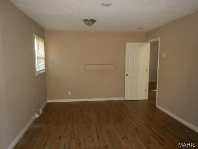 273 Buddie Ave, Saint Louis, MO 63135 - unfurnished room with wood finished floors