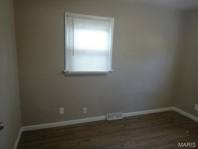 273 Buddie Ave, Saint Louis, MO 63135 - unfurnished room featuring wood finished floors and baseboards