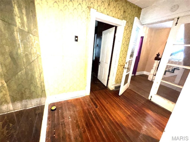 1112 Center St, Bismarck, MO 63624 - spare room with wood-type flooring and french doors
