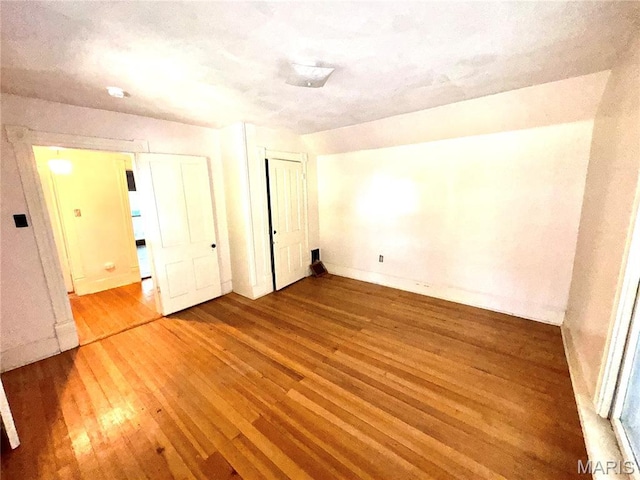 1112 Center St, Bismarck, MO 63624 - unfurnished bedroom with hardwood / wood-style floors and a closet